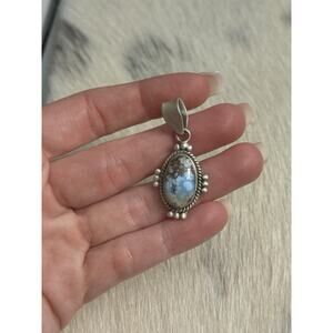 Native American Sterling Silver Blue Golden Hills Turquoise Oval Braided Pendant